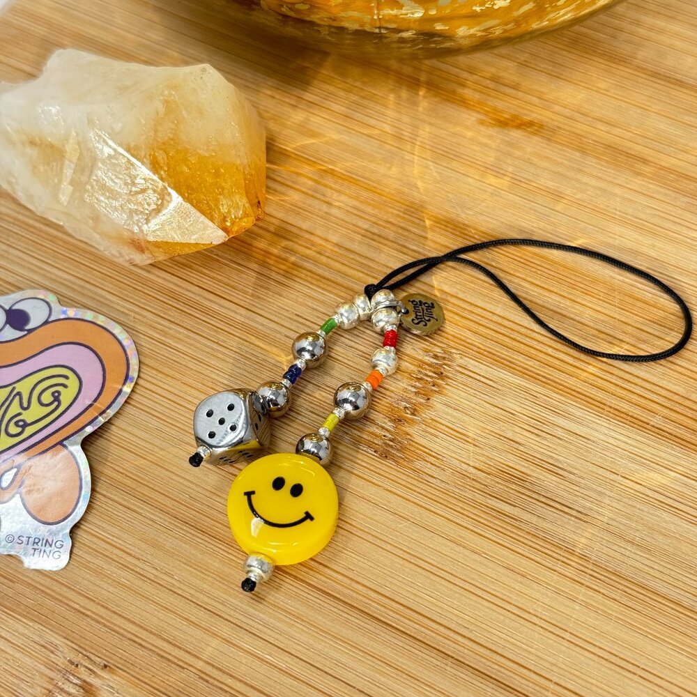 String Ting Teeny Ting Talisman | Role the Dice + Smiley Puck Bead